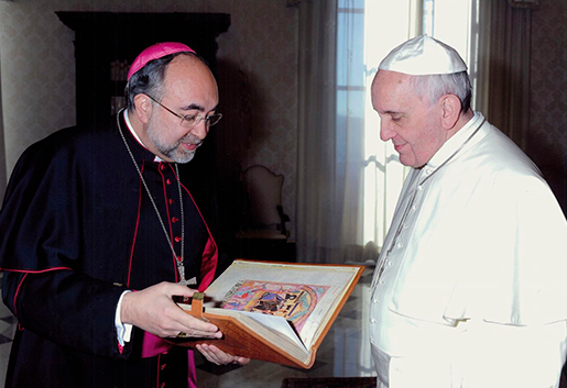 Pope Francis I with his Book of Testaments
